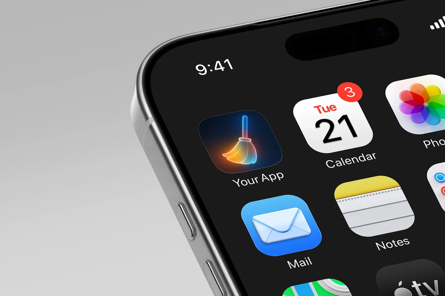 Rounded broom with rainbow-gradient bristles, a blue handle, and a soft glow on a dark navy background shown on an iPhone home screen