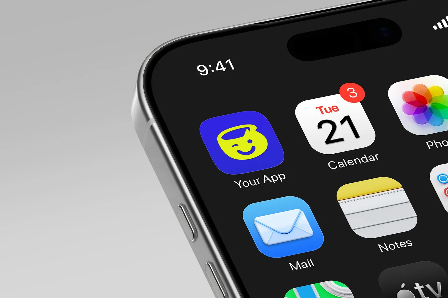 Lime-yellow rounded face with one closed eye, one round eye, a curved smile and a large top cutout on a violet background shown on an iPhone home screen